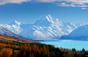 38773AM00: Aoraki / Mount Cook (3754m) and Lake Pukaki in winter. Mt La Perouse (3078m) left, Tasman Valley and Burnett Mountains Range right. Panorama with late autumn colours, Aoraki / Mount Cook National Park, MacKenzie District, New Zealand. Photocredit to be given as Rob Suisted / www.naturespic.co.nz.